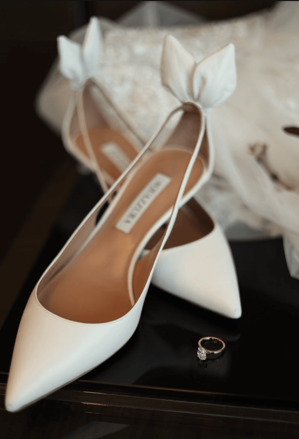 Bridal shoes and a diamond engagement ring